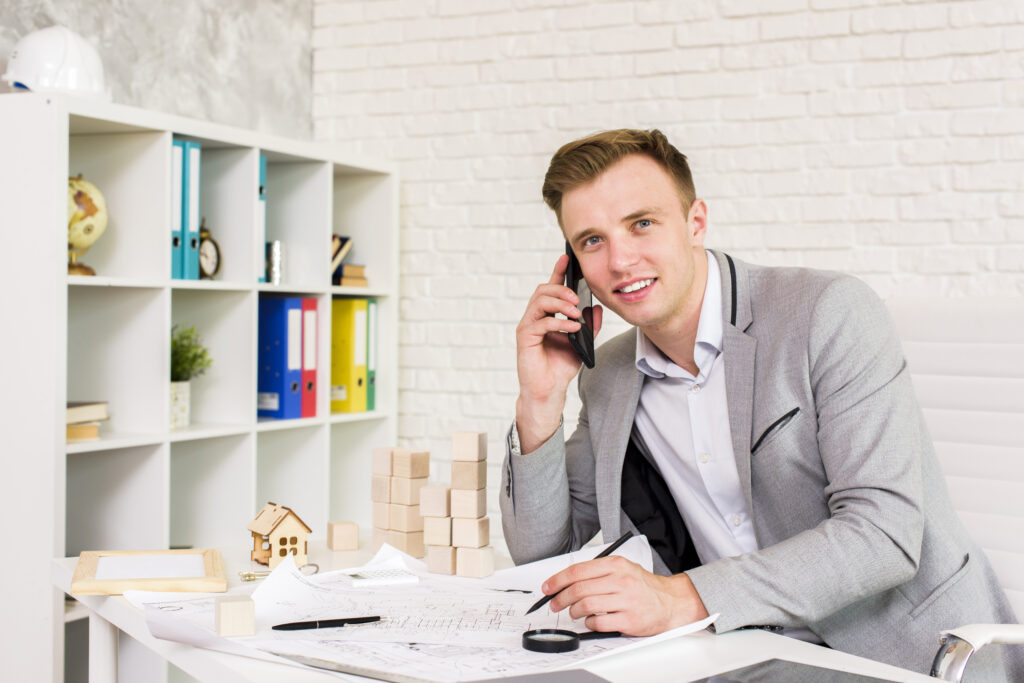 young business man talking phone